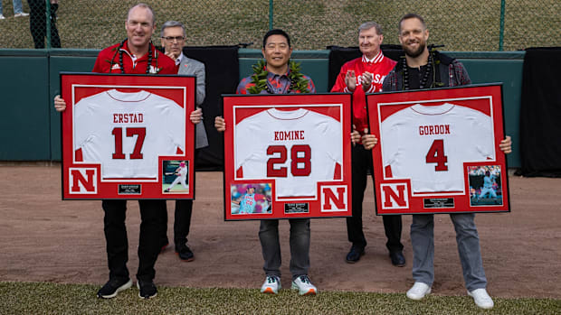 Former Huskers Darin Erstand, Shane Komine, and Alex Gordon.