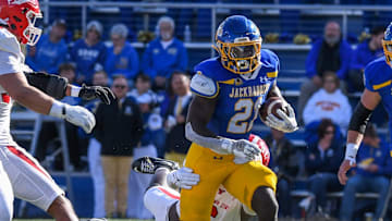 South Dakota State Jackrabbits running back Angel Johnson (21) rushes with the ball on Saturday, Oct. 12, 2024, at Dana J. Dykhouse Stadium in Brookings.