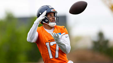 Denver Broncos wide receiver Devaughn Vele (17) catches a pass during voluntary minicamp practice at Broncos Park Powered by CommonSpirit. 