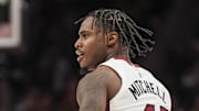 Apr 18, 2025; Atlanta, Georgia, USA; Miami Heat guard Davion Mitchell (45) reacts against the Atlanta Hawks during overtime at State Farm Arena. Mandatory Credit: Dale Zanine-Imagn Images