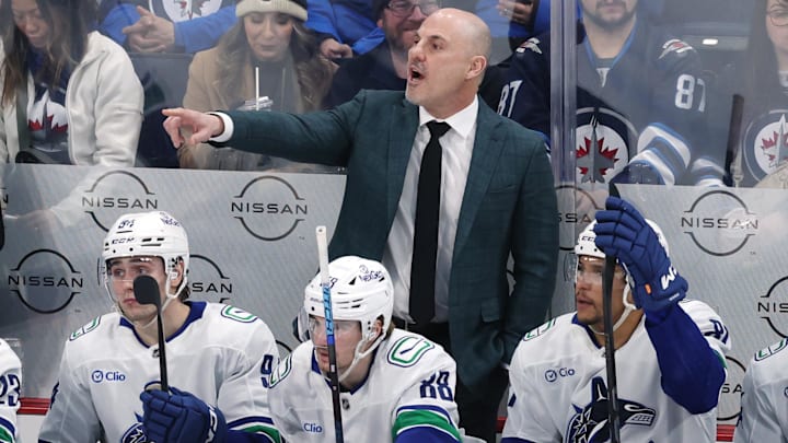 Mar 30, 2025; Winnipeg, Manitoba, CAN; Vancouver Canucks head coach Rick Tocchet gestures during a game against the Winnipeg Jets in the third period at Canada Life Centre. Mandatory Credit: James Carey Lauder-Imagn Images Mar 30, 2025; Winnipeg, Manitoba, CAN; Vancouver Canucks head coach Rick Tocchet gestures during a game against the Winnipeg Jets in the third period at Canada Life Centre. Mandatory Credit: James Carey Lauder-Imagn Images