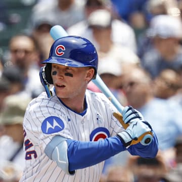 Chicago Cubs center fielder Pete Crow-Armstrong (4) bats against the Pittsburgh Pirates during the first inning at Wrigley Field on June 15.