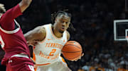 Tennessee guard Chaz Lanier (2) tries to get past Indiana guard Kanaan Carlyle (9) during a college basketball exhibition game on Sunday, October 27, 2024, in Knoxville. Tenn.