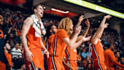 University of Illinois basketball players cheer on teammates in last week's exhibition game against Ole Miss at Oxford, Mississippi. Illinois' 2024-25 regular season begins Monday at home against Eastern Illinois.