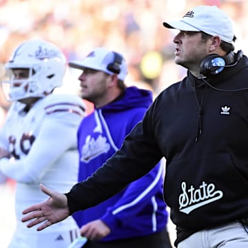 Mississippi State Bulldogs head coach Jeff Lebby  reacts after a touchdown against the Mississippi Rebels at Vaught-Hemingway Stadium. 