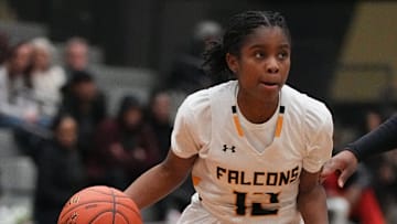 Brown Deer's Ameerah Grant (12) breaks for the paint during a home game against Shorewood on Tuesday, Feb. 11, 2025. 