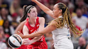 Indiana Fever guard Caitlin Clark (22) passes the ball against Atlanta Dream guard Haley Jones (13) on Thursday, June 13, 2024, during the game at Gainbridge Fieldhouse in Indianapolis. The Indiana Fever defeated the Atlanta Dream, 91-84.