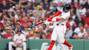 Boston, Massachusetts, USA; Boston Red Sox third baseman Marcelo Mayer (39) hits a solo home run during the second inning against the Tampa Bay Rays at Fenway Park.
