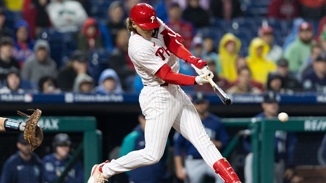 Apr 26, 2023; Philadelphia, Pennsylvania, USA; Philadelphia Phillies first baseman Alec Bohm (28) hits an RBI single during the eighth inning against the Seattle Mariners at Citizens Bank Park. Apr 26, 2023; Philadelphia, Pennsylvania, USA; Philadelphia Phillies first baseman Alec Bohm (28) hits an RBI single during the eighth inning against the Seattle Mariners at Citizens Bank Park.
