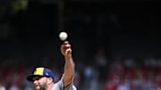 Milwaukee Brewers starting pitcher Wade Miley (20) pitches against the St. Louis Cardinals during the fourth inning at Busch Stadium in 2023.