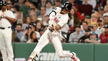 Jun 2, 2025; Boston, Massachusetts, USA; Boston Red Sox outfielder Jarren Duran (16) hits a double against the Los Angeles Angels during the fifth inning at Fenway Park. Mandatory Credit: Brian Fluharty-Imagn Images