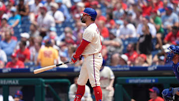 Jun 11, 2025; Philadelphia, Pennsylvania, USA; Philadelphia Phillies designated hitter Kyle Schwarber (12) watches after hitting a home run against the Chicago Cubs in the third inning at Citizens Bank Park. 