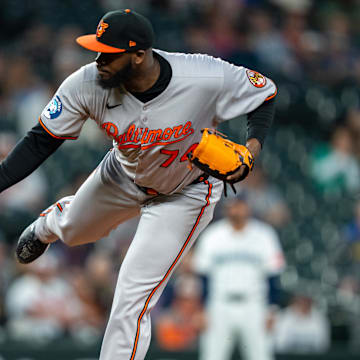 Jun 4, 2025; Seattle, Washington, USA;  Balitimore Orioles reliever Felix Bautista (74) delivers a pitch during the ninth inning against the Seattle Mariners at T-Mobile Park.