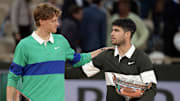 Jannik Sinner of Italy and Carlos Alcaraz of Spain pose together after French Open men’s final.
